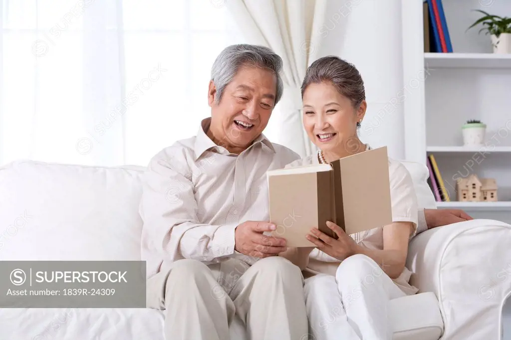 Senior Couple Reading Together