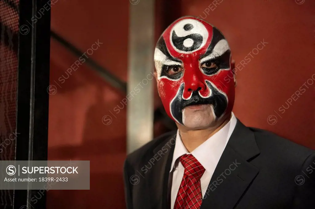Man Wearing Business Suit, With Face Paint