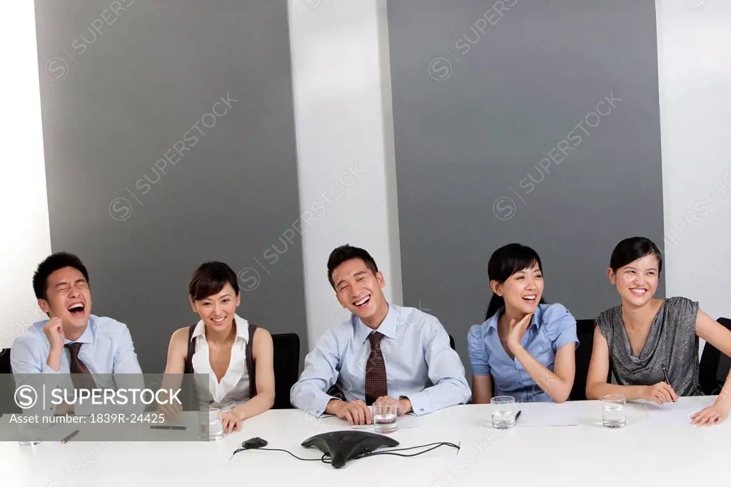 Colleagues Laughing Together