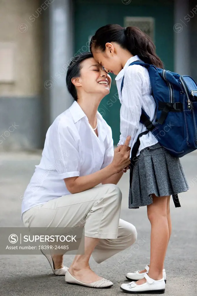 Chinese schoolgirl with grandmother