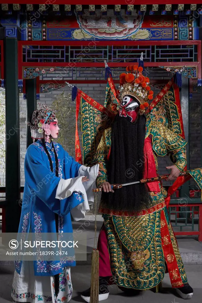 Man And Woman In Ceremonial Costume