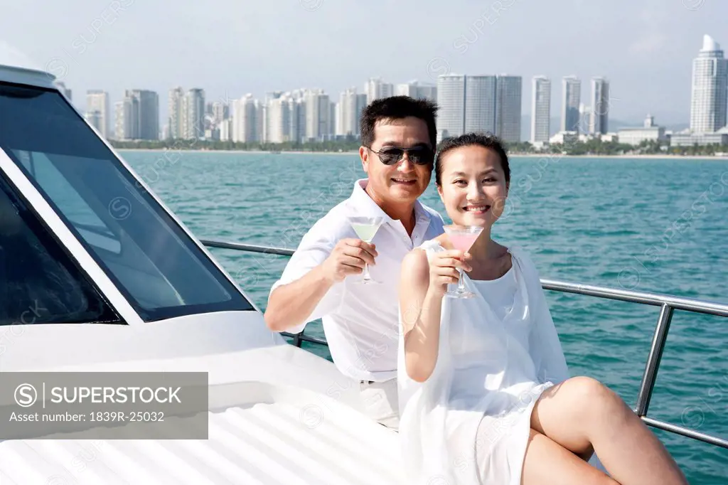 Couple Relaxing on a Yacht