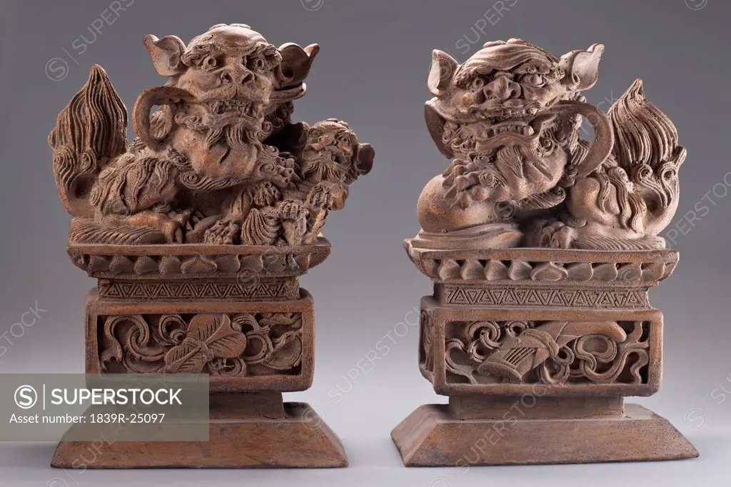 Two traditional Chinese lion statues