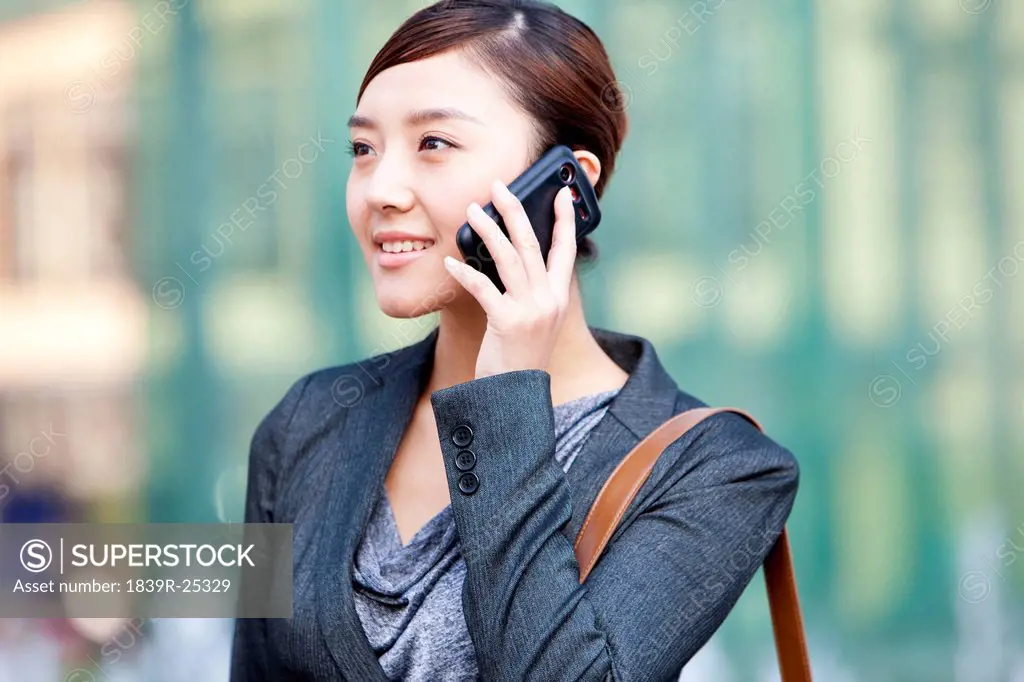 Chinese businesswoman talking on the phone