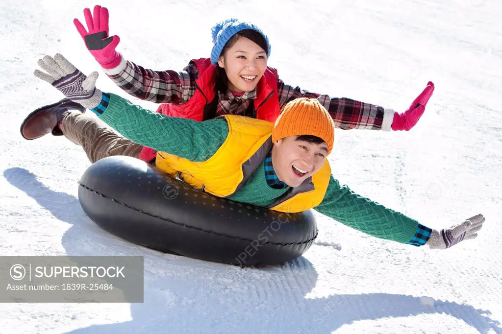 Happy young people having fun in ski resort