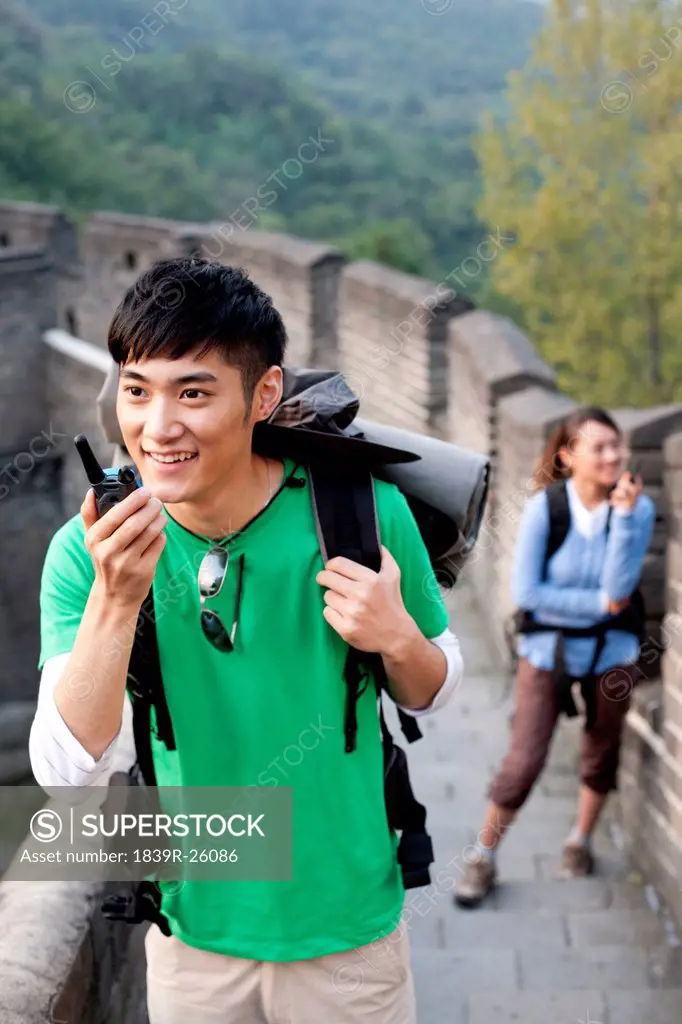 Young people go hiking on the Great Wall