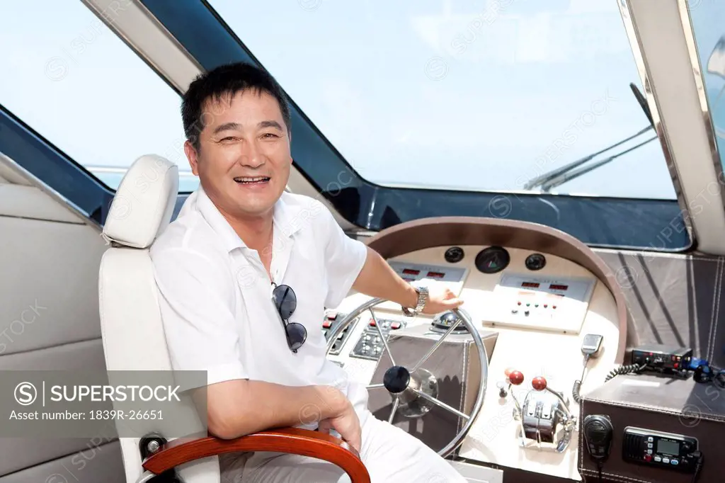 Man in a Yacht Cockpit