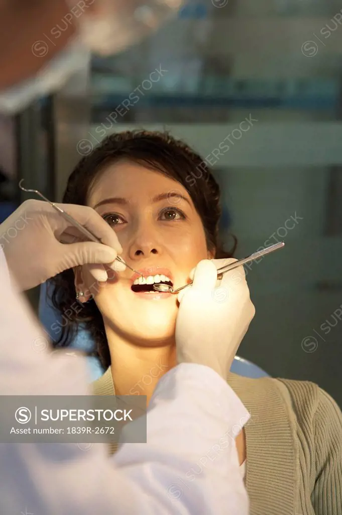 Woman Having Her Teeth Examined