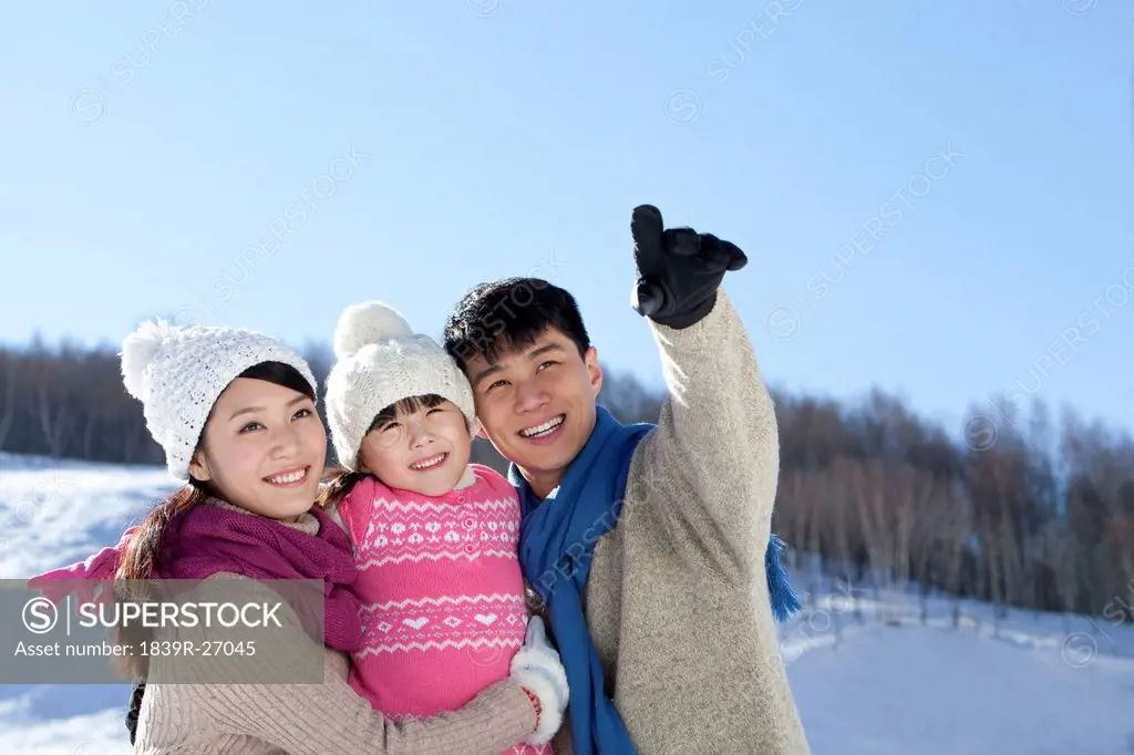 Family looking afar in winter time
