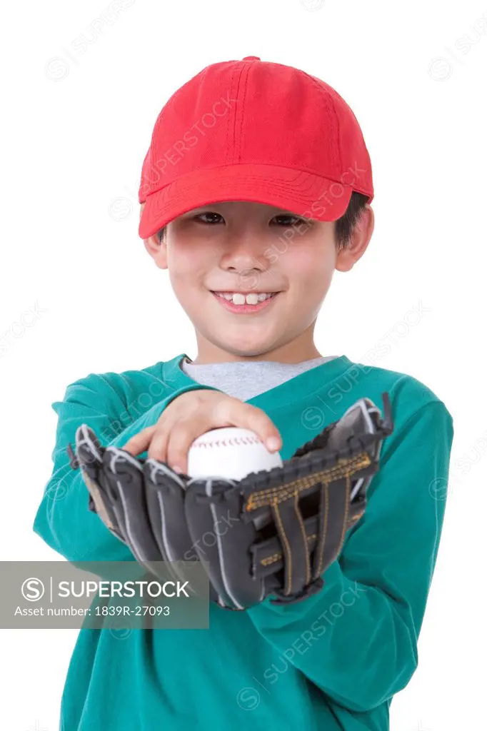 Little boy with baseball gear