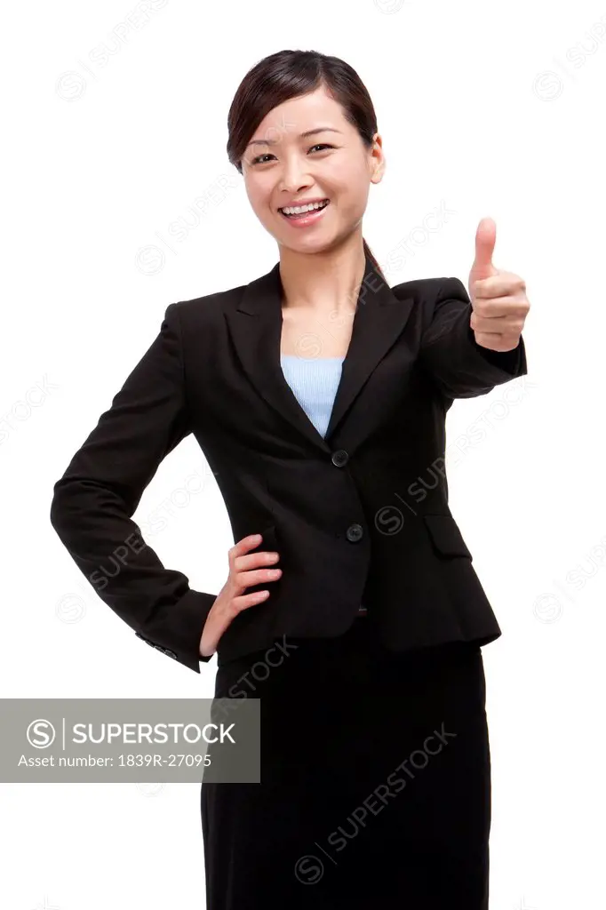 Businesswoman doing thumbs_up
