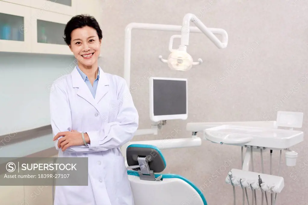 Dentist in dental clinic