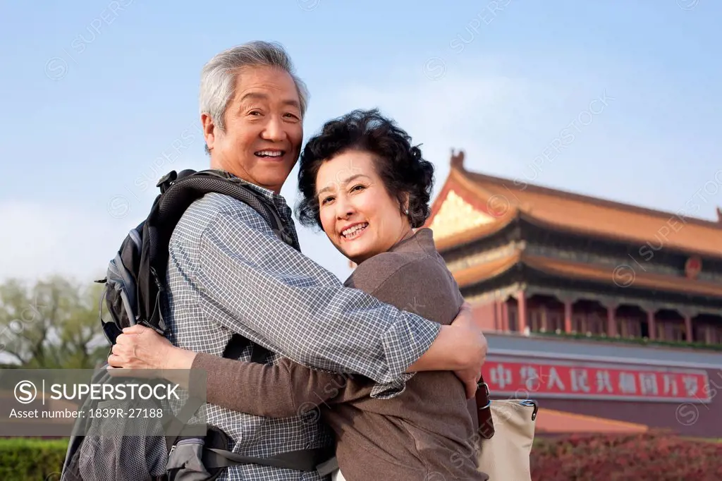 Senior couple travelling at Tiananmen Square in Beijing, China