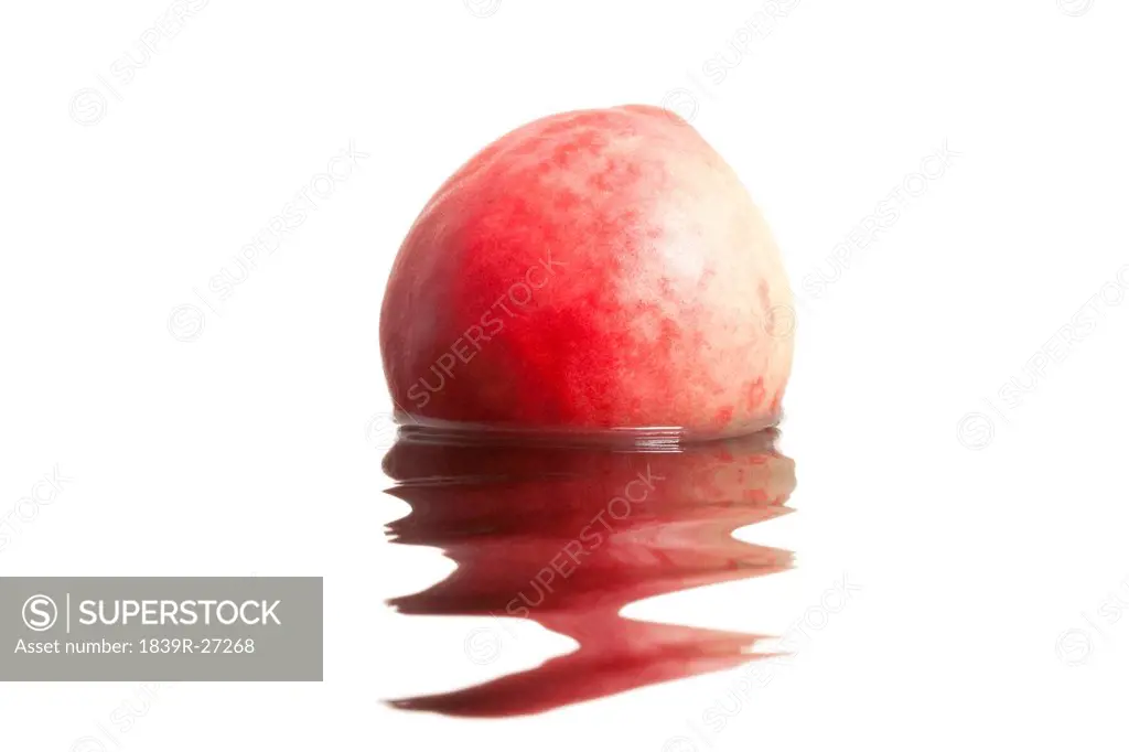Peach in rippling water