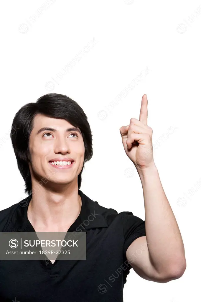 Young Man Pointing Up
