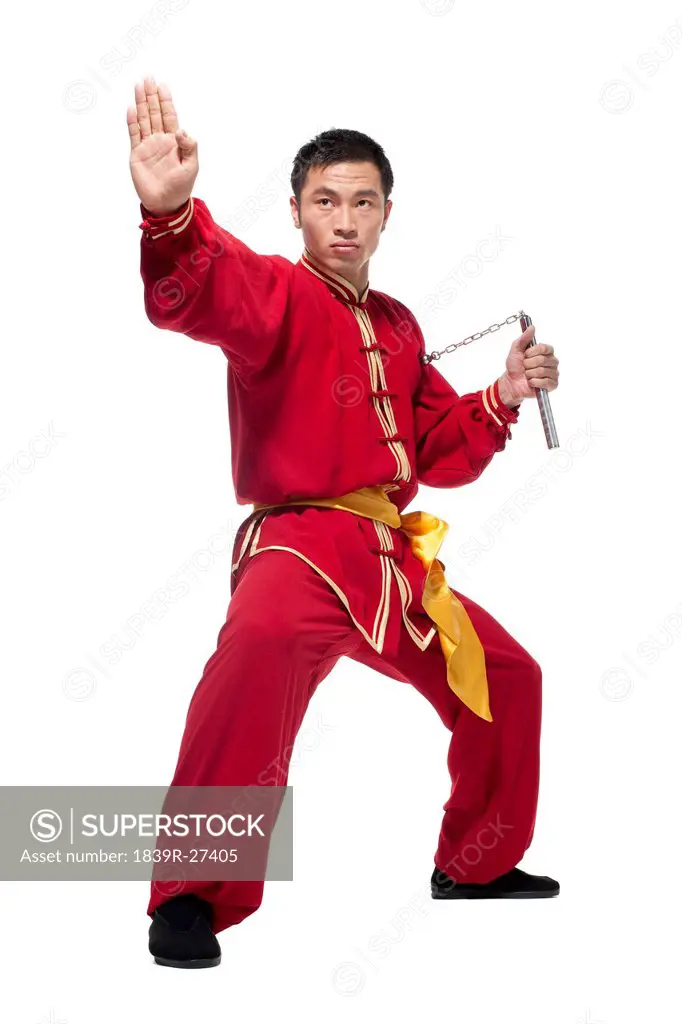 Man In Traditional Chinese Clothing doing Martial Arts