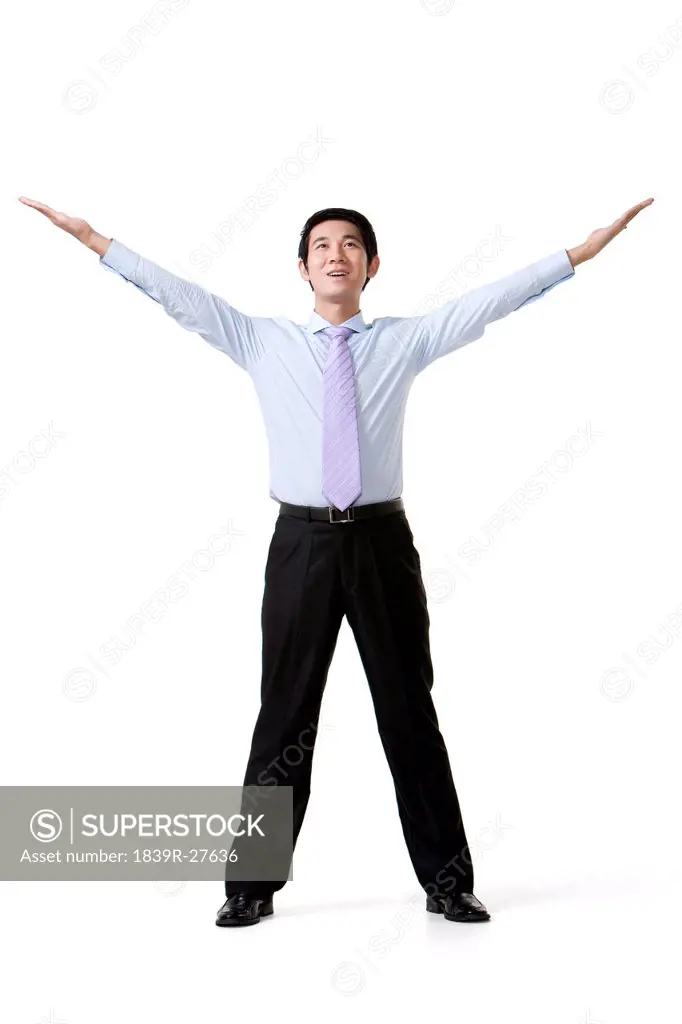 Businessman Holding Arms Out Wide