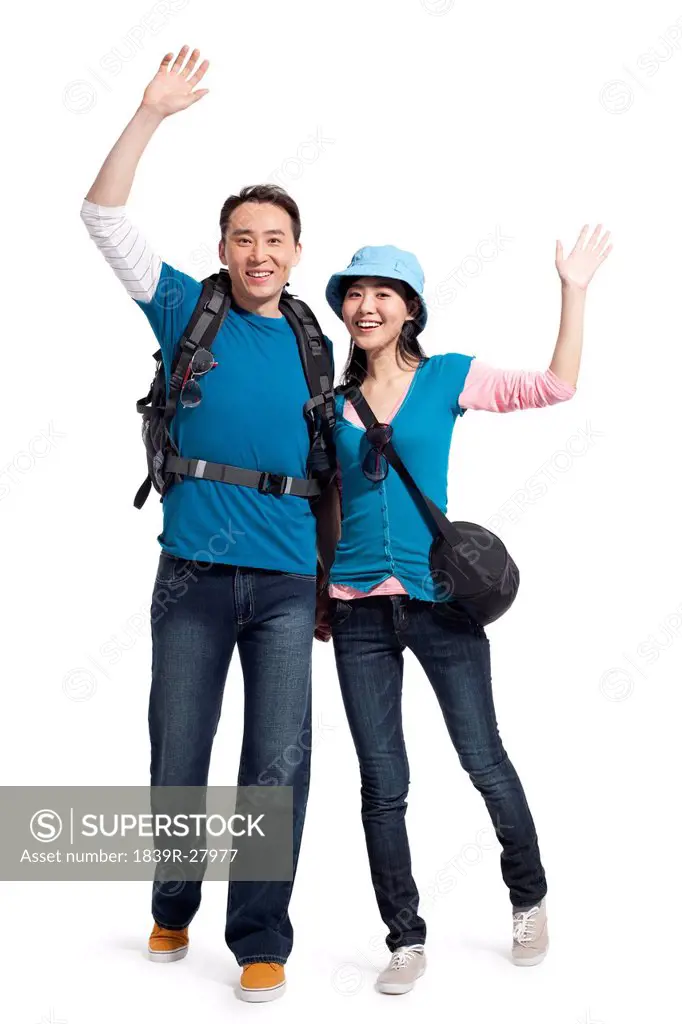 Portrait of young couple travelling