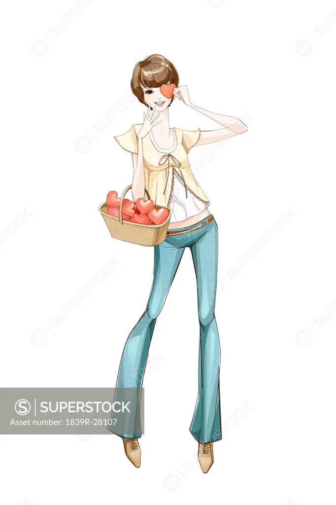 Young girl with heart_shape fruits