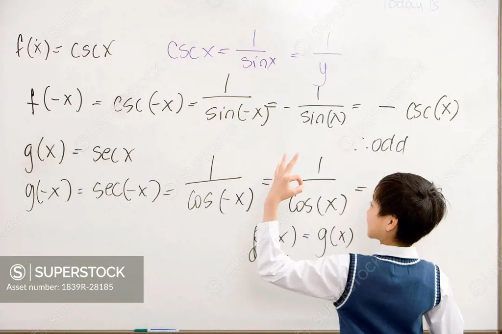 Student doing a math on the whiteboard