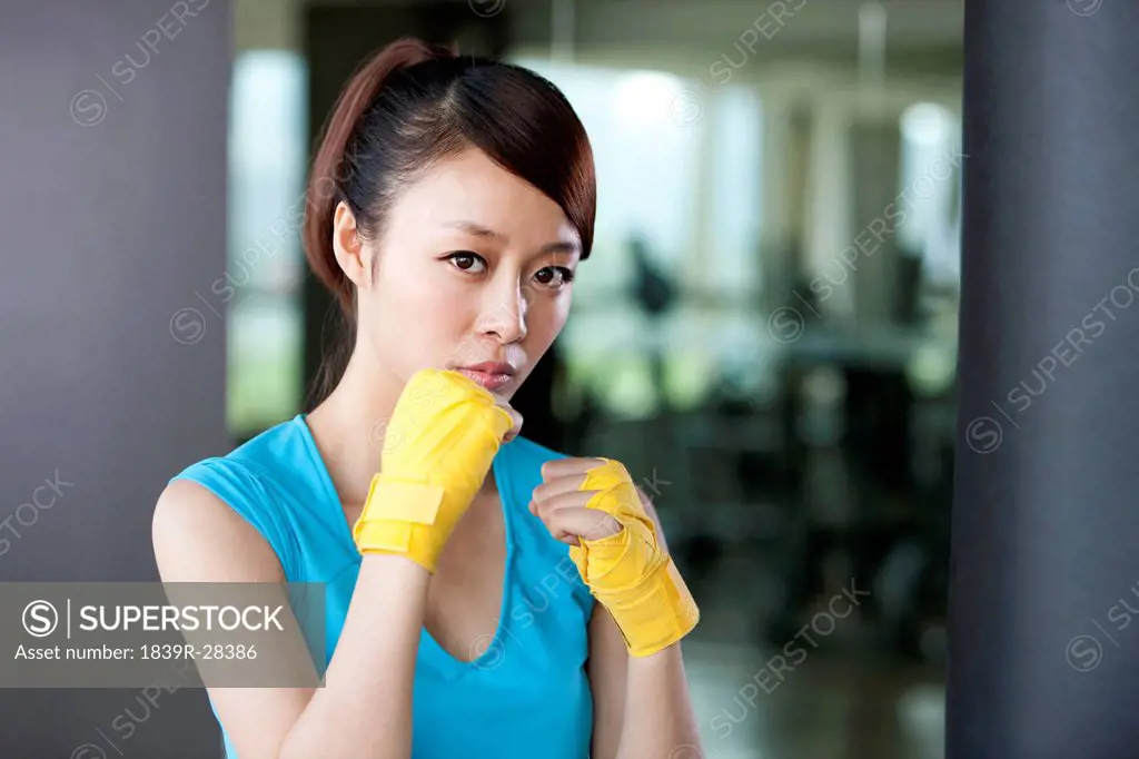 Young Woman in Hand Wraps