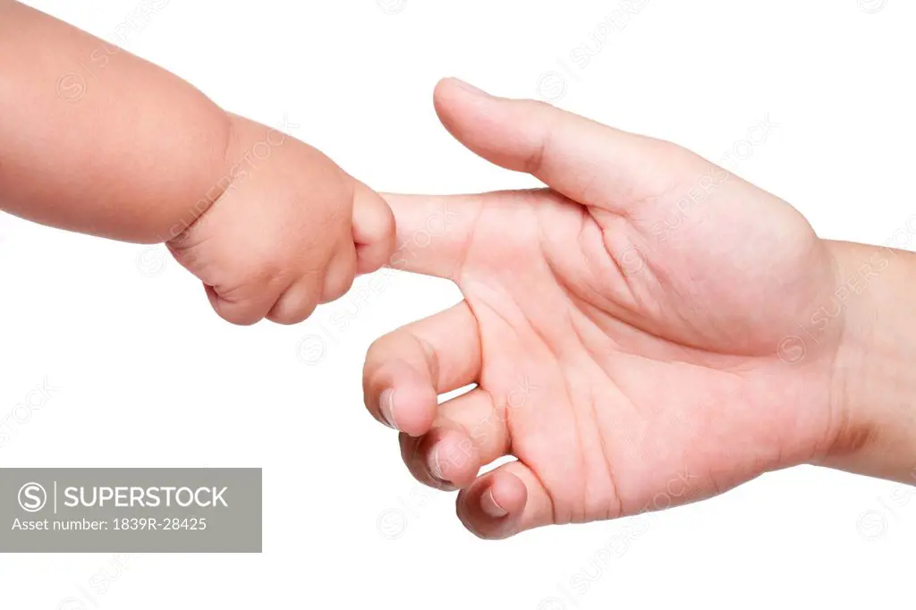 Son Holding Father´s Finger