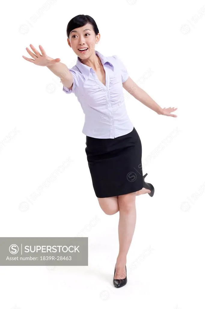 Portrait of a Businesswoman Running Towards