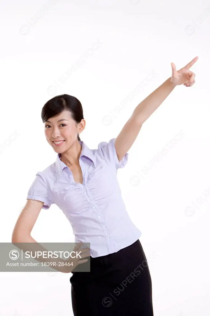 Excited Businesswoman Pointing