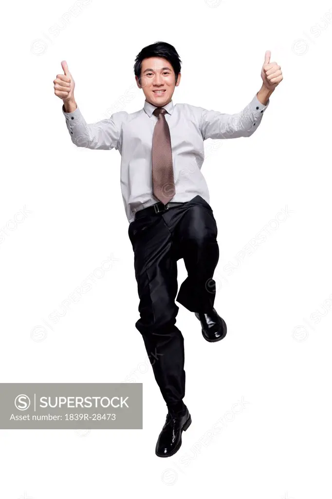 Businessman Jumping in the Air Gesturing