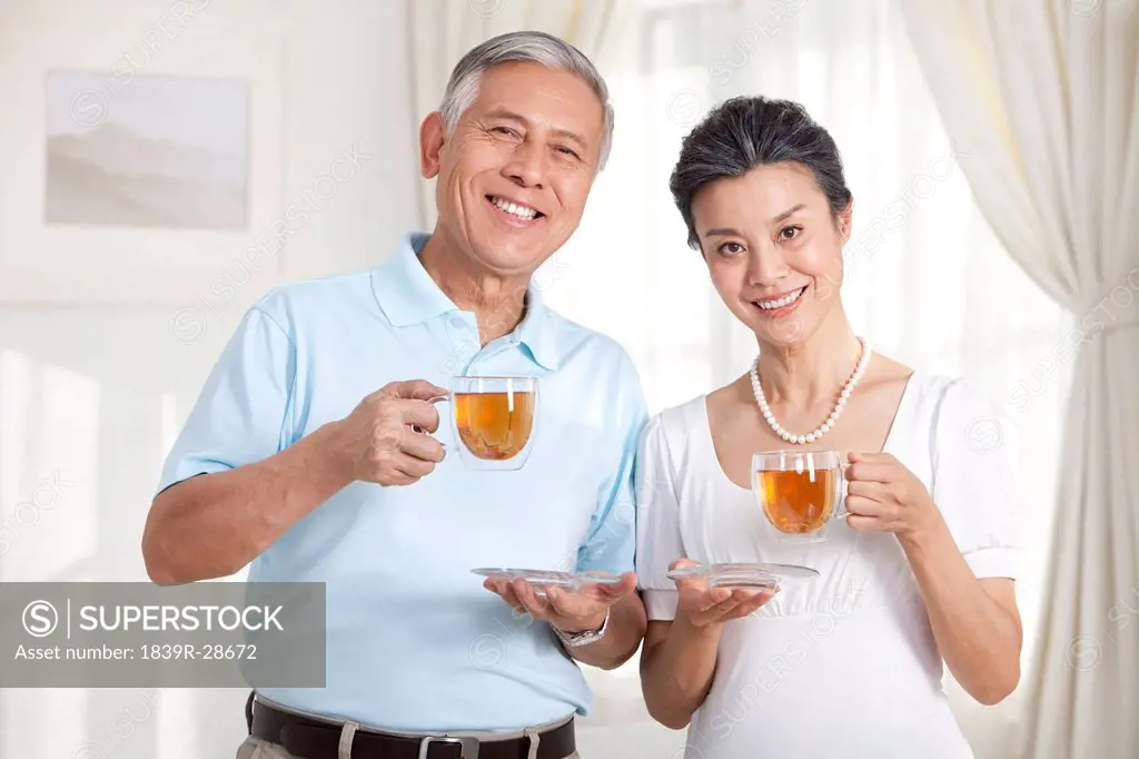 Senior couple with tea