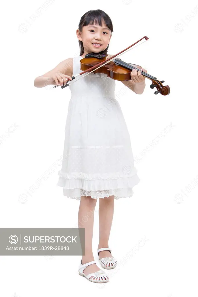 Little girl playing the violin