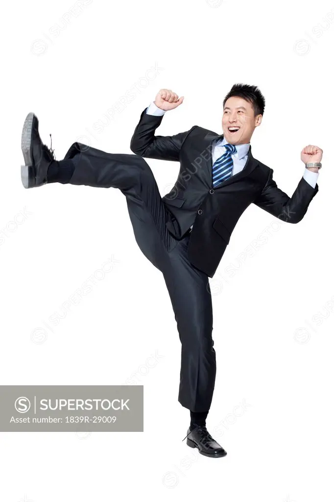 An excited young businessman