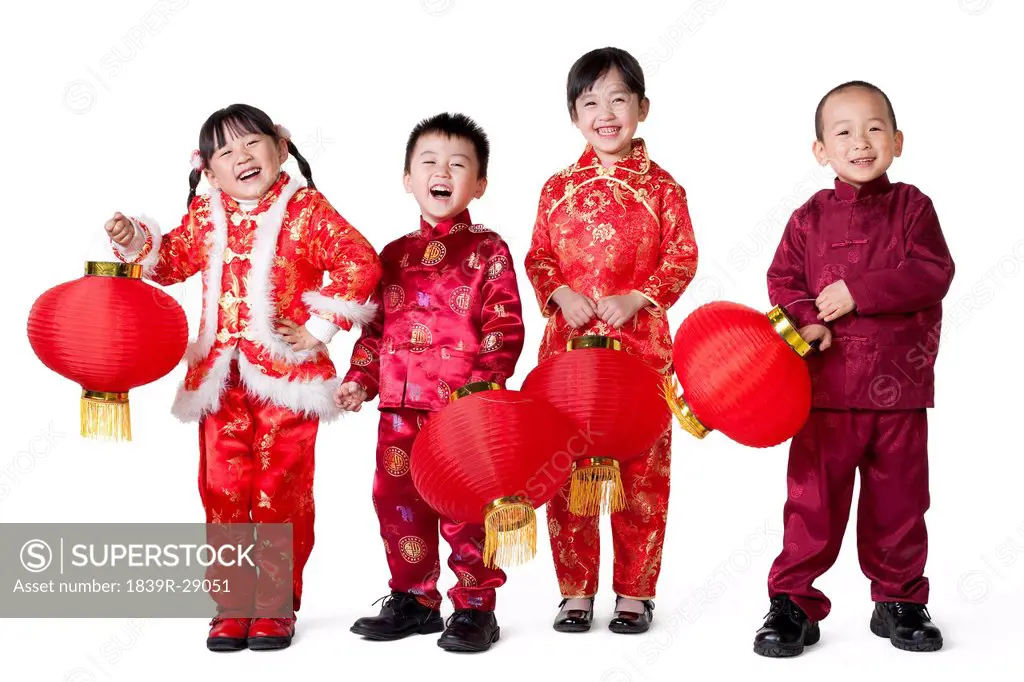 Four Chinese children holding Chinese lanterns