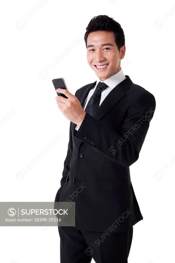 Businessman using cellphone