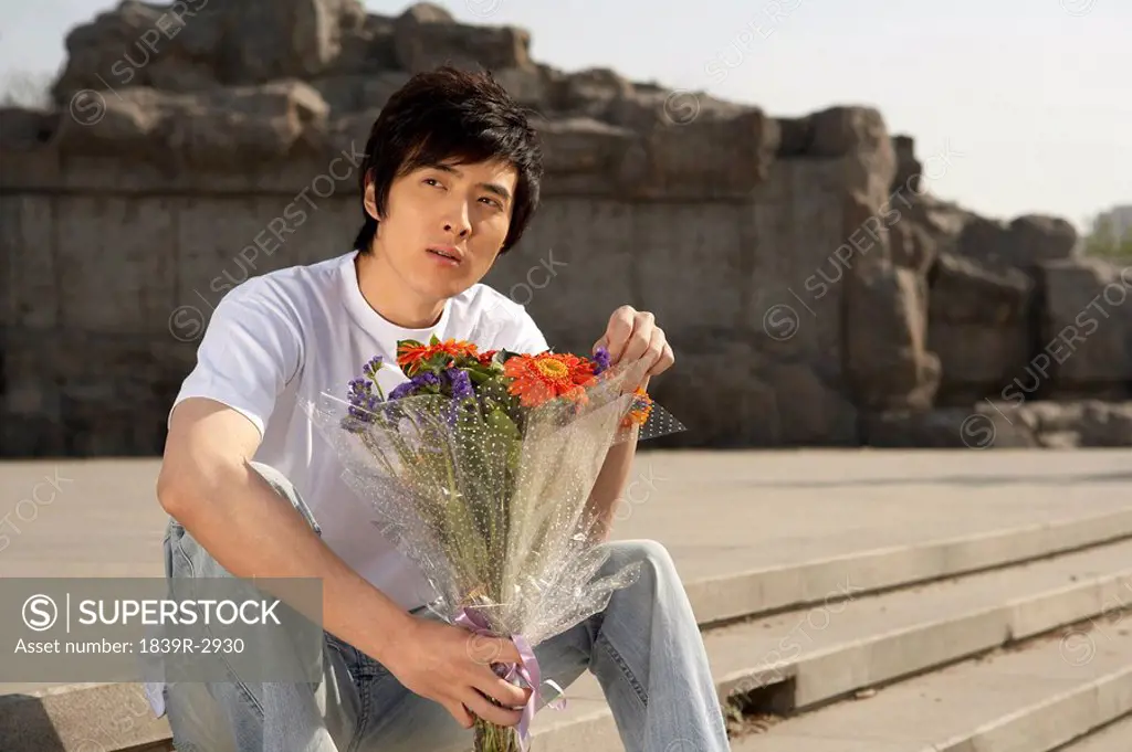 Man With Bouquet Of Flowers