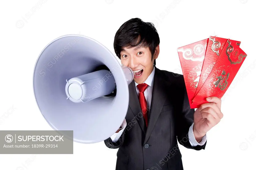 Businessman Shouting into a Megaphone