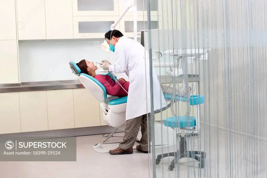 Patient receiving treatment in dental clinic