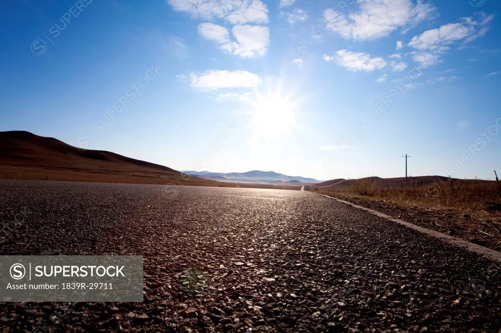 A low angle of a country road in Inner Mongolia