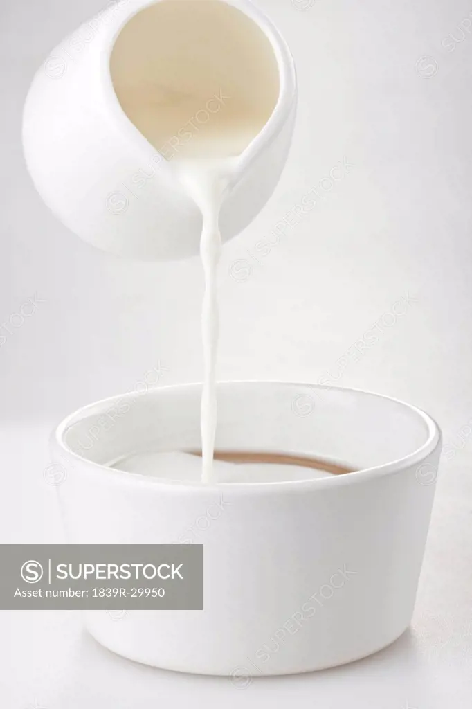 Milk Poured Into a Bowl