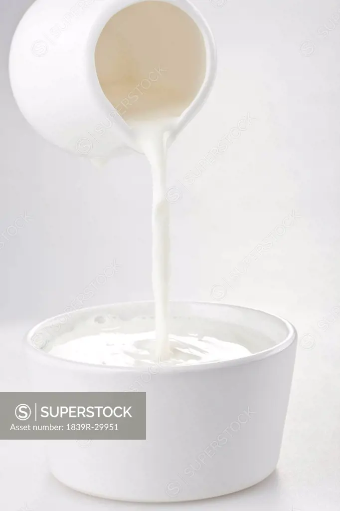 Milk Poured Into a Bowl