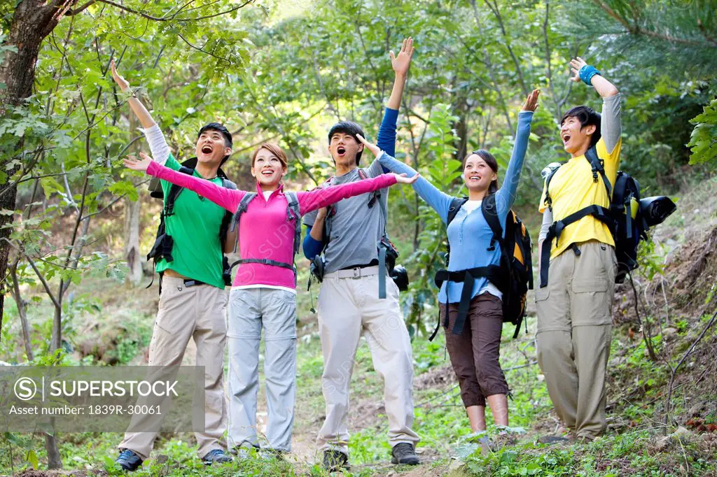 Young people go hiking in mountain