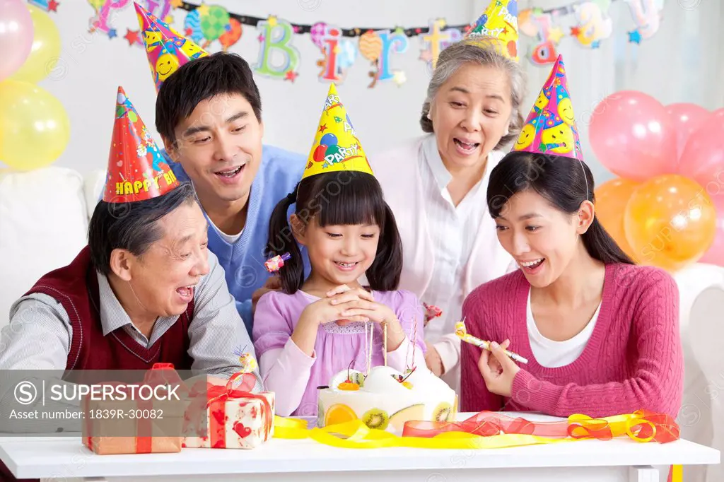 Young Chinese girl´s birthday with family