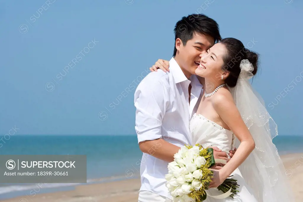 Newlywed Couple on the Beach