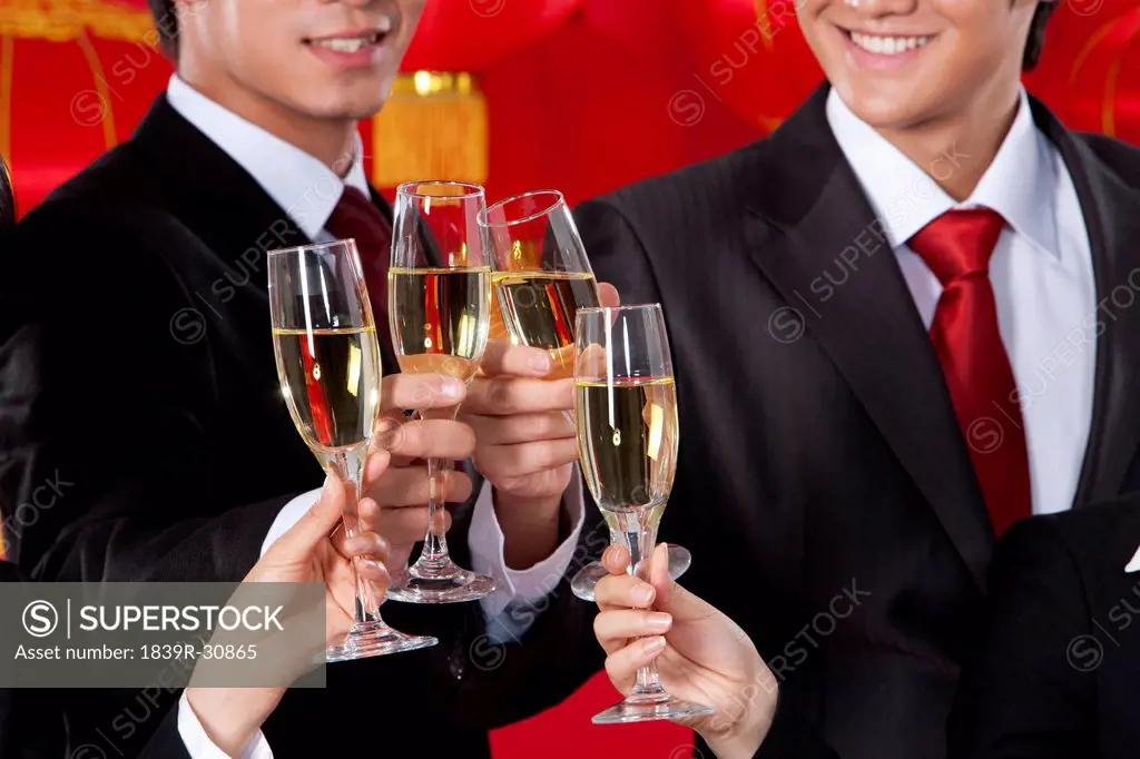 Business Team sharing Champagne