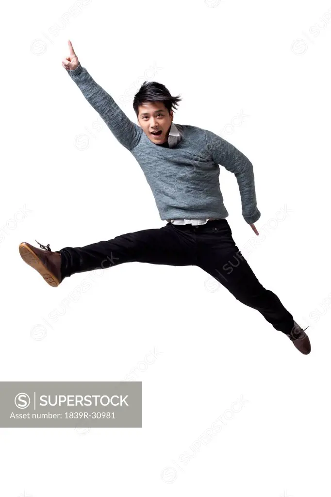 Young man jumping in mid_air