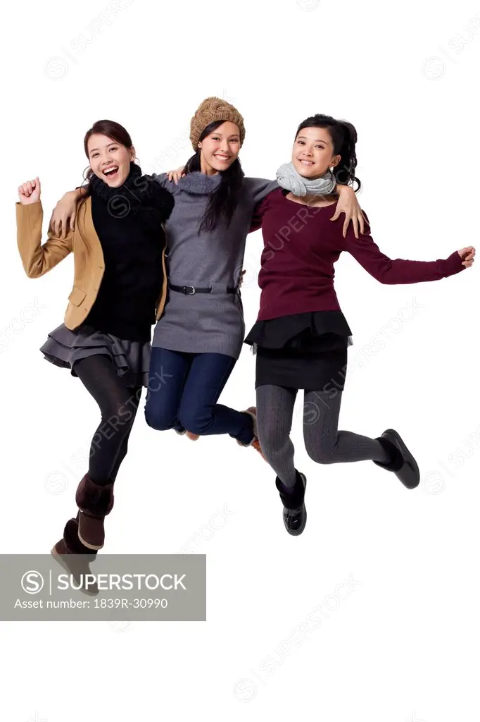 Young women jumping in mid_air