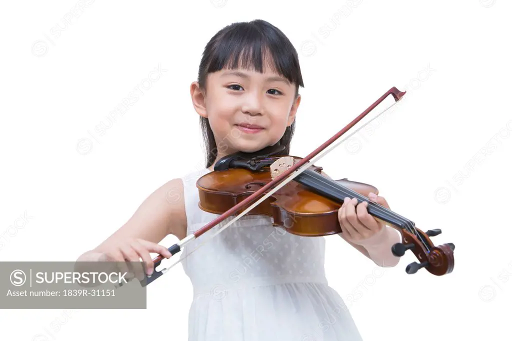 Little girl playing the violin