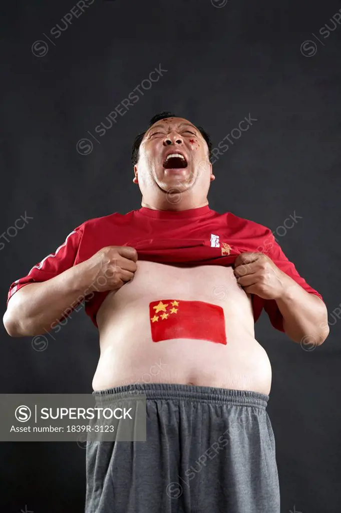 Man With Flag Painted On His Stomach