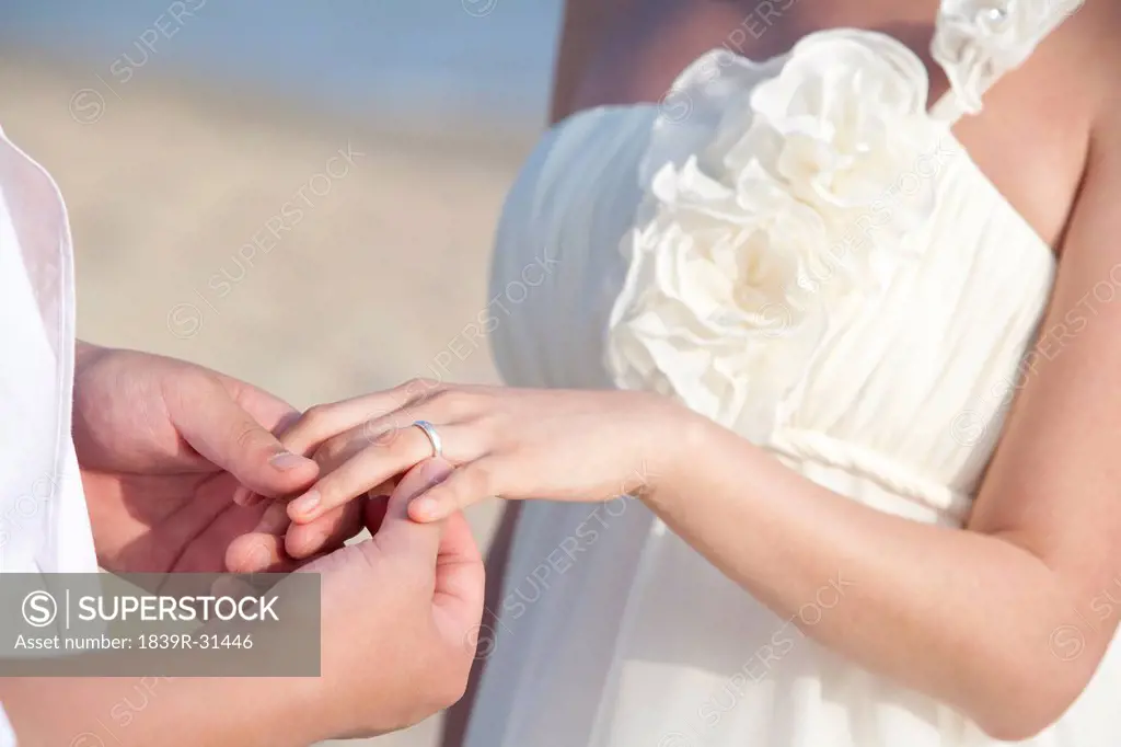 Newlyweds Holding Hands