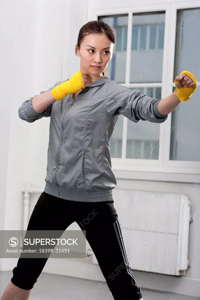 Determined Woman Boxing